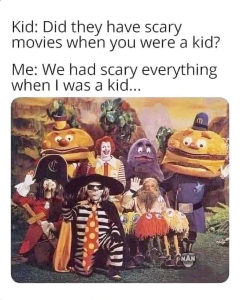 An uncanny nostalgia meme capturing childhood horror, showing an interaction about scary movies where an adult responds "We had scary everything when I was a kid...", paired with a deeply unsettling group photo of the vintage 1970s McDonaldland costume characters including Mayor McCheese, the Hamburglar, and a creepy Ronald McDonald.