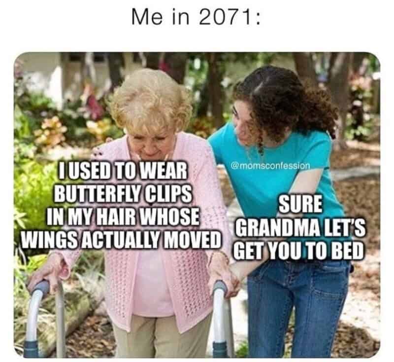 A hilarious future-projection nostalgia meme utilizing a stock photo of an elderly woman with a walker being guided by her granddaughter, overlaid with a joke about millennials trying to explain moving-wing Y2K butterfly hair clips to the younger generation.