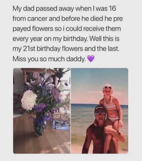 A bouquet of flowers next to a throwback picture of a father holding his young daughter.