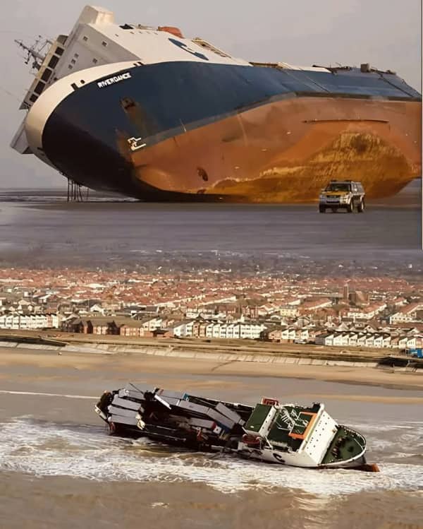 Split screen showing a massive tipped cargo ship aground on a beach near a coastal town.