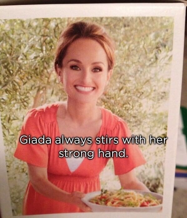 A product display package featuring celebrity chef Giada De Laurentiis presenting a plate of food, showing an accidental photoshop fail where her left arm and hand appear comically shrunken and tiny compared to her head.