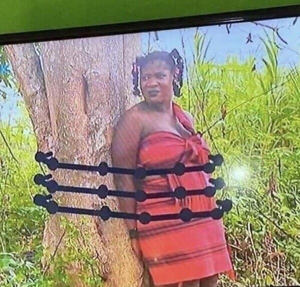 close-up of a television screen showing a movie character tied to a tree, where the ropes are crudely drawn over her body using a basic digital phone marker brush, a hilariously lazy photoshop fail.