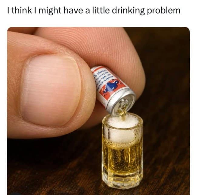 A masterfully shot funny pun close-up shows a gigantic human thumb and finger carefully pinching a microscopic aluminum beer can under the header, "I think I might have a little drinking problem." The tiny novelty can is seen pouring a minuscule amber stream into an equally tiny glass mug overflowing with real foam.