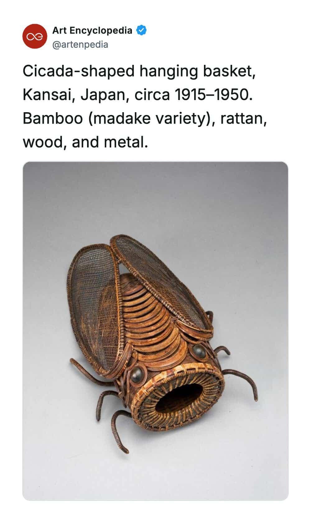 rare historical photo showcasing an exquisite cicada-shaped hanging basket from the Kansai region of Japan, crafted circa 1915-1950. The sculptural artifact is intricately hand-woven using madake variety bamboo, rattan, wood, and dark metal elements to realistically mimic the insect's segmented body and mesh wings.