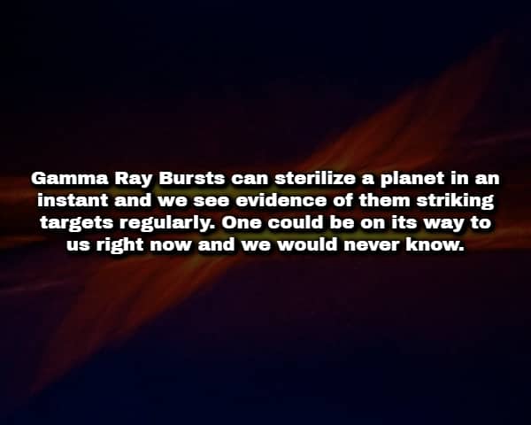 Abstract orange cosmic explosion with text about planet sterilizing Gamma Ray Bursts.