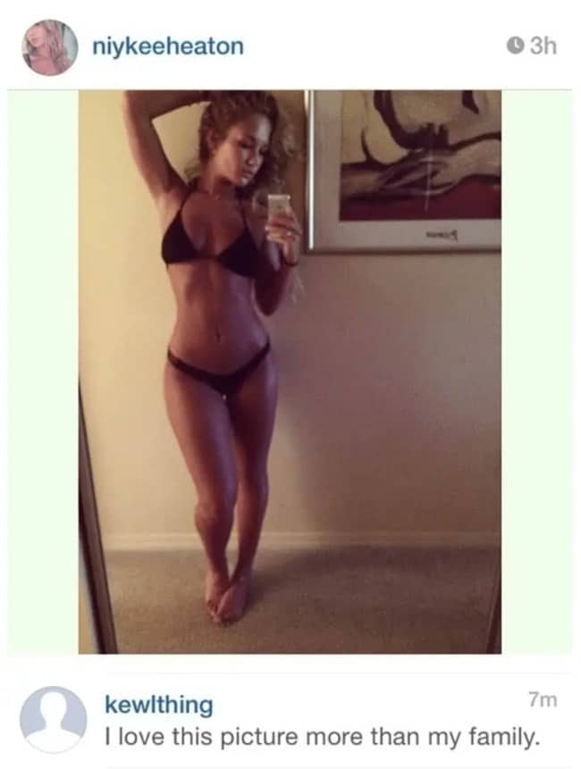 iykee Heaton mirror selfie in a black bikini with a comment prioritizing the photo over family.