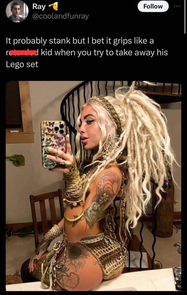Woman with blonde dreadlocks taking a mirror selfie with a bizarrely specific grip strength comment.