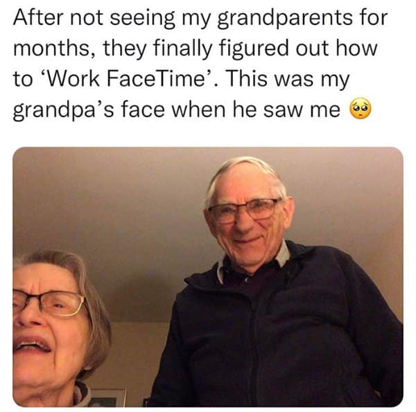 A heartwarming mobile phone screenshot saved as a wholesome meme, capturing the wide, tearful, and deeply loving smile of an elderly grandfather looking at his grandchild through FaceTime for the first time in months.