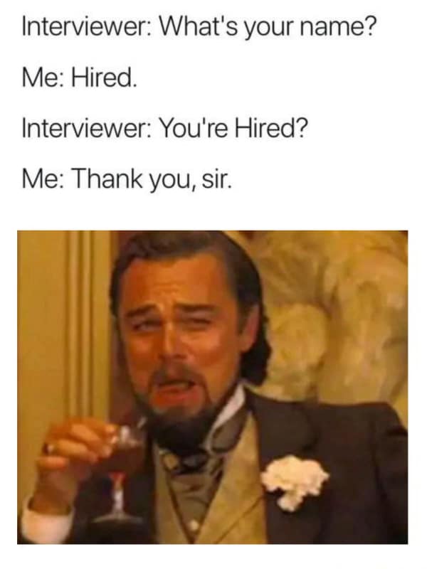 An interview-humor work meme pairs a screenshot of Leonardo DiCaprio’s smug laughing character from Django Unchained with a text dialogue detailing a dad-joke wordplay maneuver to instantly trick an interviewer into saying "You're hired."