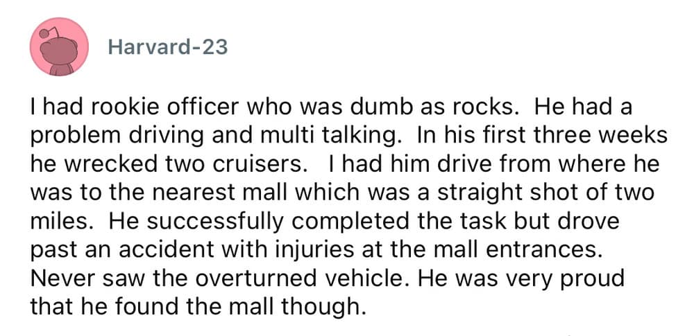 A worst employee stories screenshot from user Harvard-23 detailing a rookie police officer who wrecked two cruisers in three weeks and completely failed to notice a massive, overturned vehicle with injuries at a mall entrance despite driving right past it.