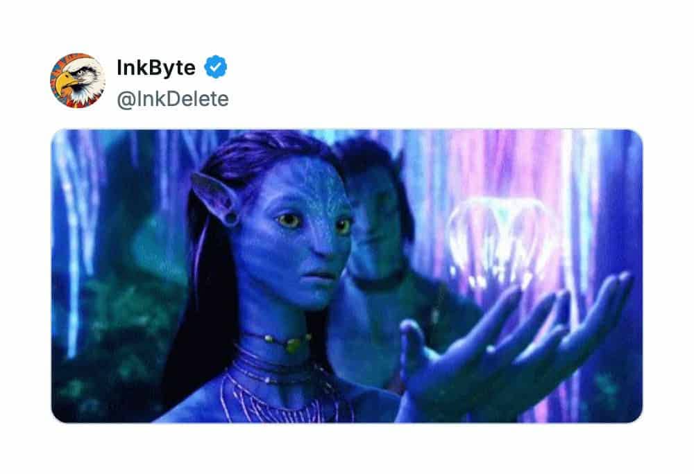 Movie scene from Avatar featuring Neytiri holding a glowing woodprite floating over her hand.