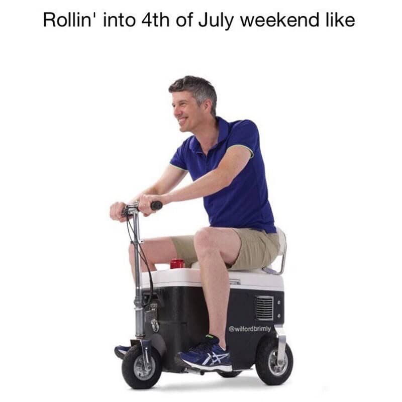 A classic lifestyle-focused 4th of july meme captures the peak energy of three-day holiday weekends using a clean product stock photo. It features a smiling man in a blue polo shirt and khaki shorts cruising along while sitting directly on a custom, motorized black-and-white cooler scooter vehicle under the header text: "Rollin' into 4th of July weekend like".