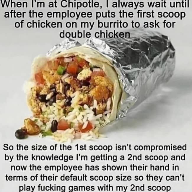 A large wrapped Chipotle burrito spilled open on a white surface with text about double chicken hacks.