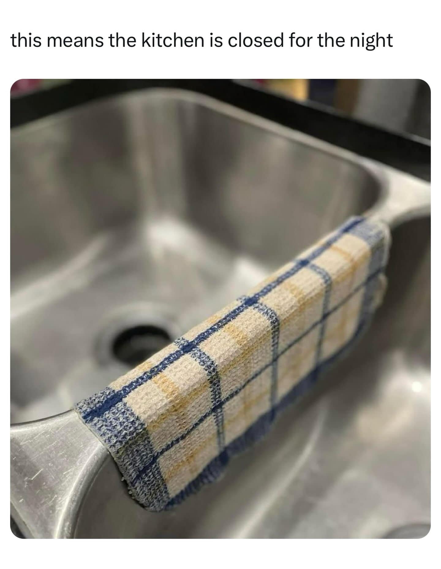A deeply traditional household warning within the best memes layout displays a close-up of a double-basin stainless steel kitchen sink with a plaid dish towel neatly draped over the center divider.