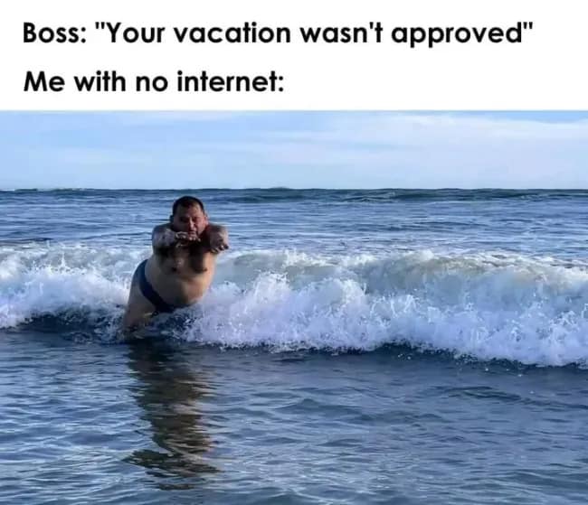 An entertaining classic meme captures a man diving horizontally through ocean waves to represent disconnecting your phone after a boss denies your time-off request.