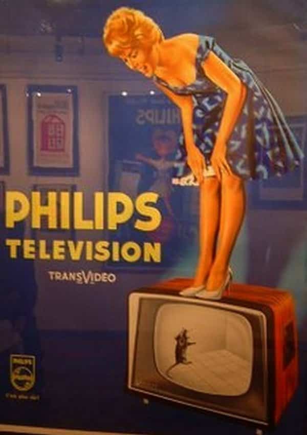 Vintage Philips television creative ad showing a woman standing on a TV scaring at a mouse.