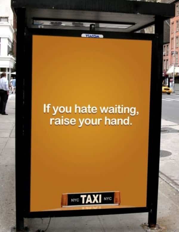 Interactive NYC taxi bus shelter creative ad encouraging waiting commuters to raise their hand to hail.