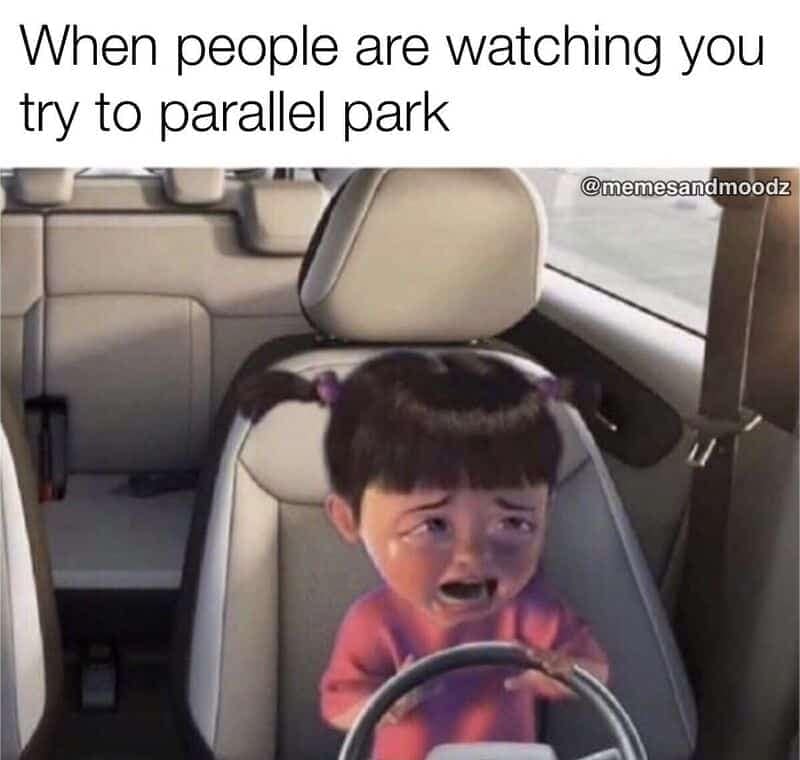 An anxiety-inducing driving meme utilizing the crying Boo behind the wheel template to visualize the extreme psychological pressure of trying to parallel park while an active audience watches you.