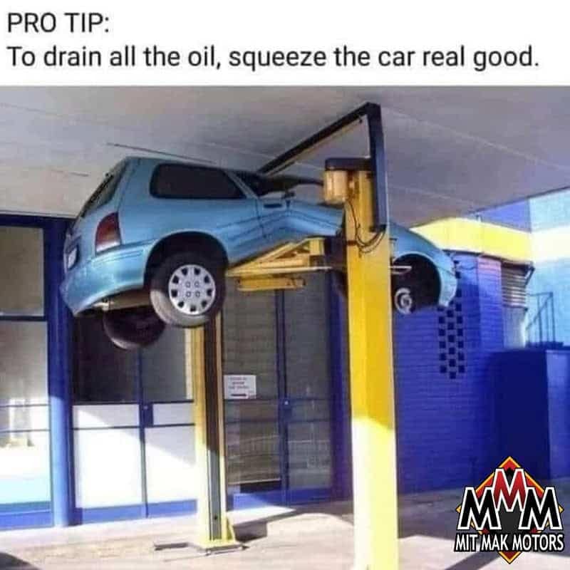 A sarcastic mechanical driving meme displaying a small blue hatchback crushed completely against a low garage ceiling by an over-extended hydraulic lift, framed as a "pro tip" for squeezing out the oil.