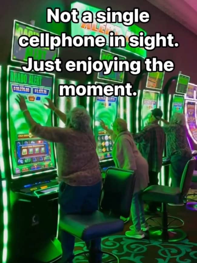 Group of elderly people playing neon slot machines avoiding reality dark meme.