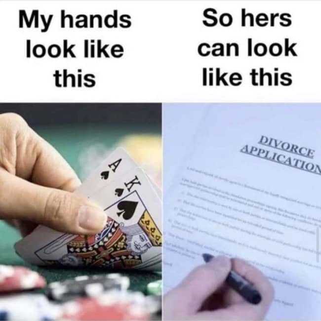 Close-up of poker hands next to divorce application papers life gamble dark meme.