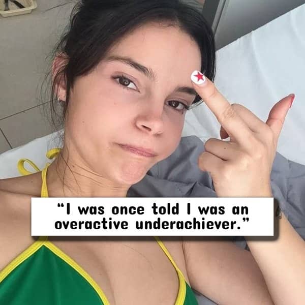 Woman in a green bikini gesturing with her middle finger under a self-deprecating quote.