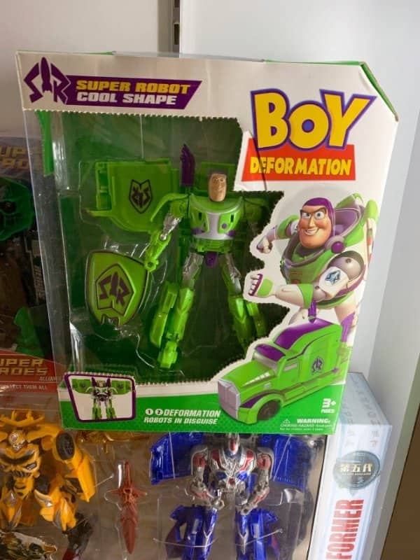 Funny fake products Buzz Lightyear toy packaged as a green transforming Boy Deformation robot.