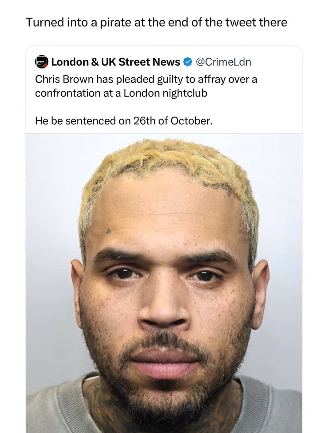 Funny memes tweet highlighting a grammatical typo in a news story about Chris Brown.