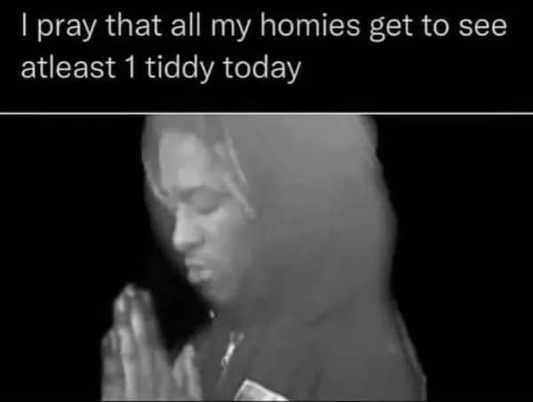 Black and white reaction meme of a man praying with hands together for his friends.