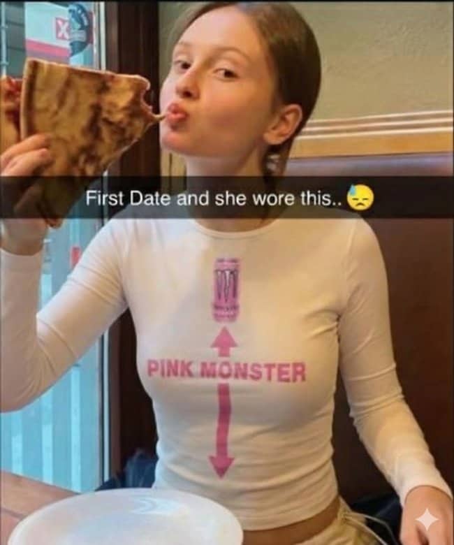 Girl eating pizza in a pink Monster Energy graphic crop top featuring funny outfits.