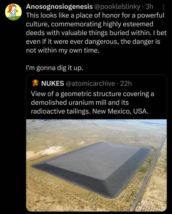 Aerial view of a massive concrete geometric structure sealing a demolished uranium mill in New Mexico.