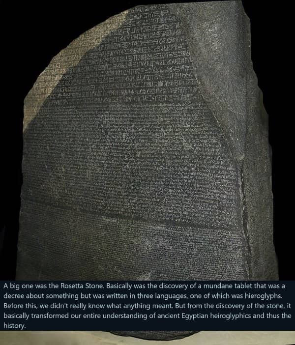 The Rosetta Stone displayed against a black background, with text explaining how it deciphered hieroglyphs.