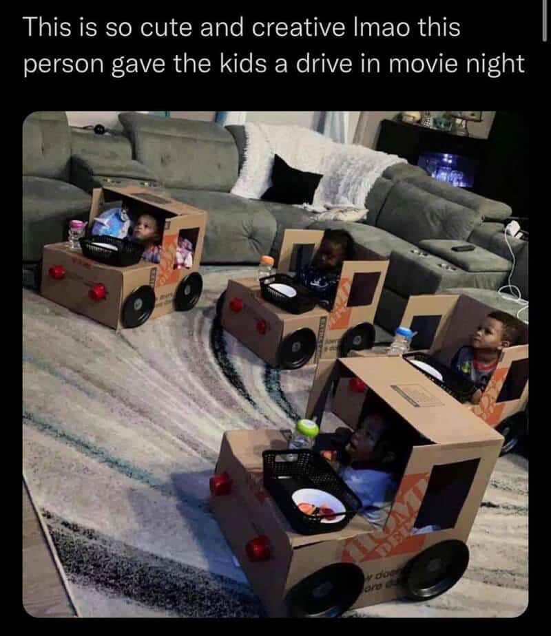An incredibly heartwarming meme dump photo captures a genius living room layout where four toddlers watch television from custom Home Depot cardboard box cars for an indoor drive-in movie night.