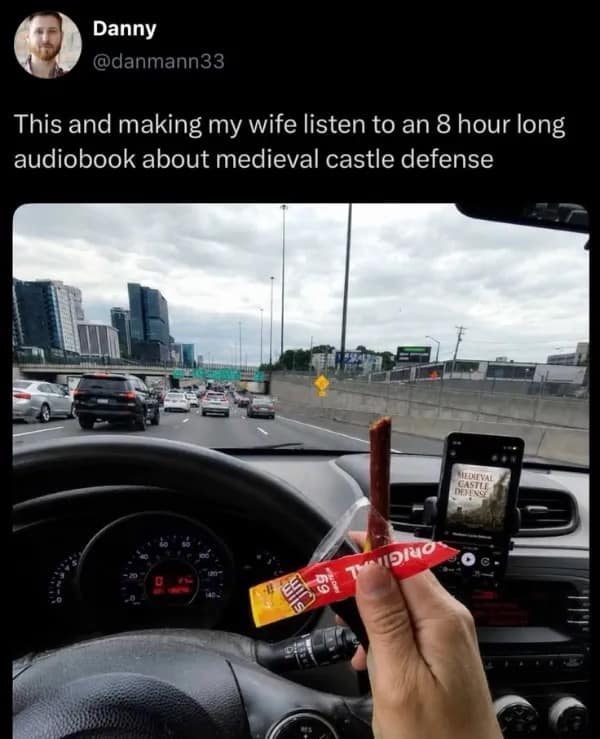 This highway driving entry in the meme dump captures a husband forcing his wife to listen to an 8-hour medieval castle defense audiobook while he holds a snack stick.