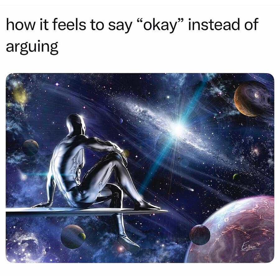 Reaching nirvana, this meme dump template displays a cosmic sci-fi comic illustration under the text layer, "how it feels to say 'okay' instead of arguing." The art features Marvel's Silver Surfer reflecting in total isolation, sitting calmly on his metallic surfboard floating through deep space while surrounded by swirling nebulae, galaxies, and distant planetary spheres.