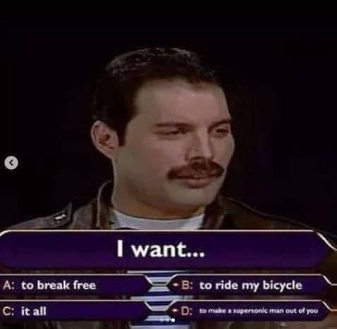 Freddie Mercury edited onto a game show screen with multiple choice options starting with "I want."