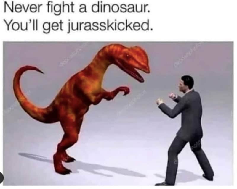 Dilophosaurus dinosaur squaring up to fight a businessman in a suit.