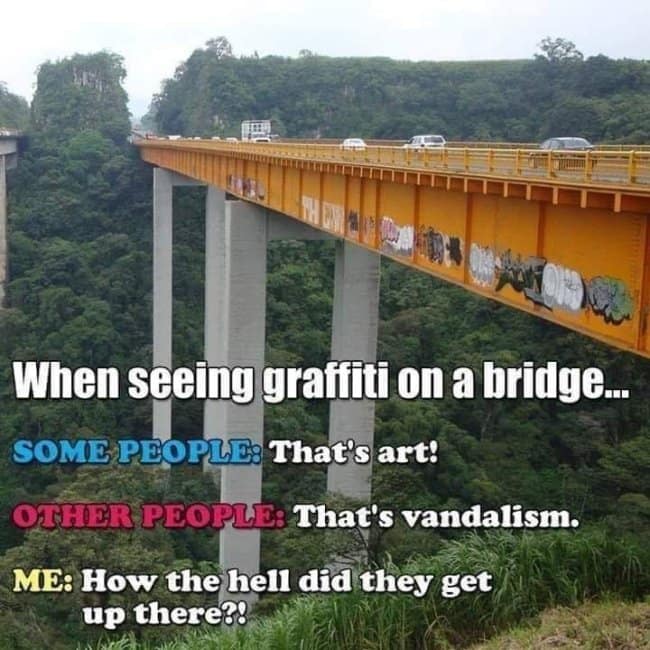 A funny road trip meme showing a high orange valley bridge covered in graffiti with text questioning how the vandals even managed to climb up there.