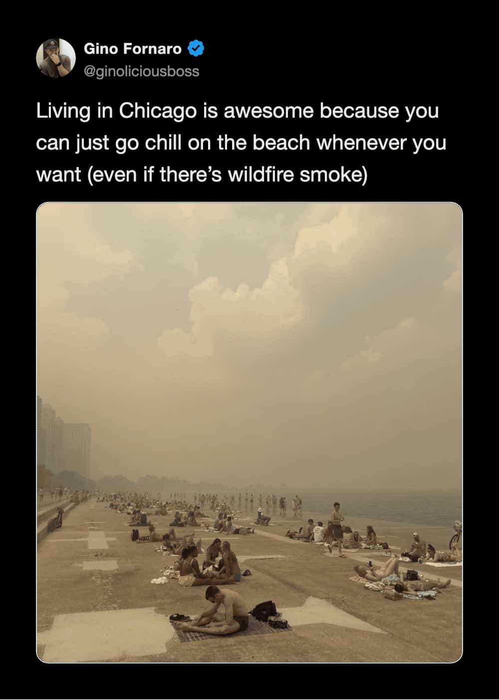 Chicago beachgoers sunbathing under an apocalyptic orange sky in a relatable wildfire smoke meme.