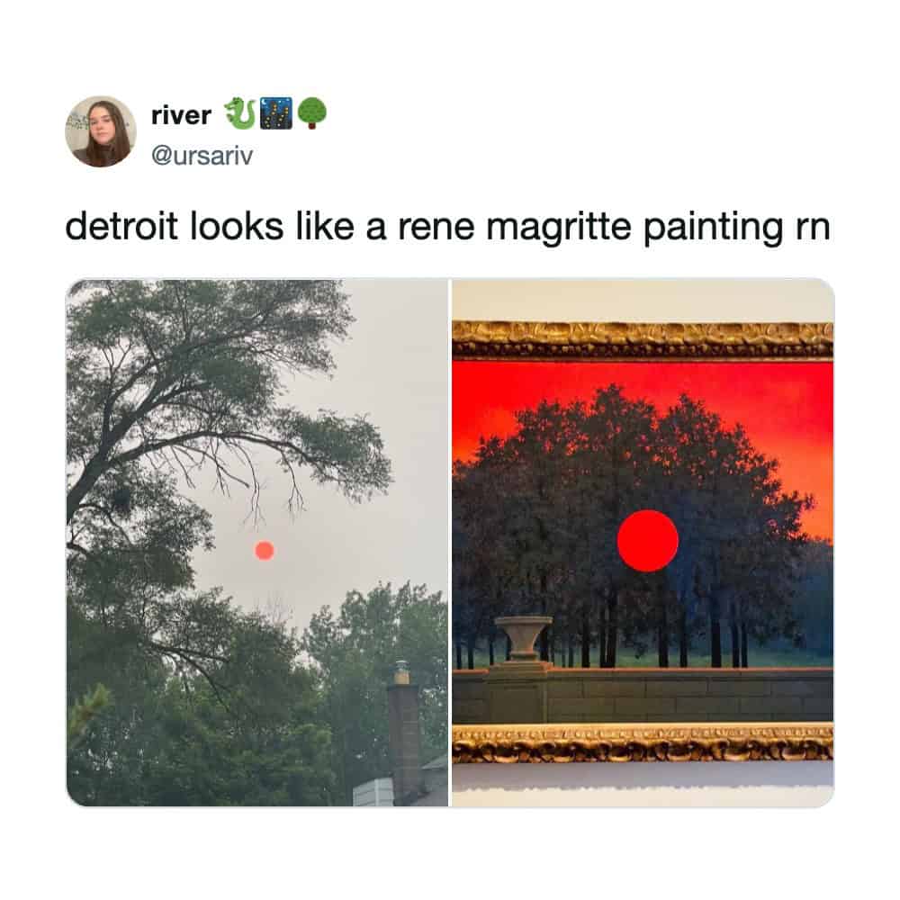 Detroit skyline compared to a surrealist René Magritte painting during a wildfire smoke event.
